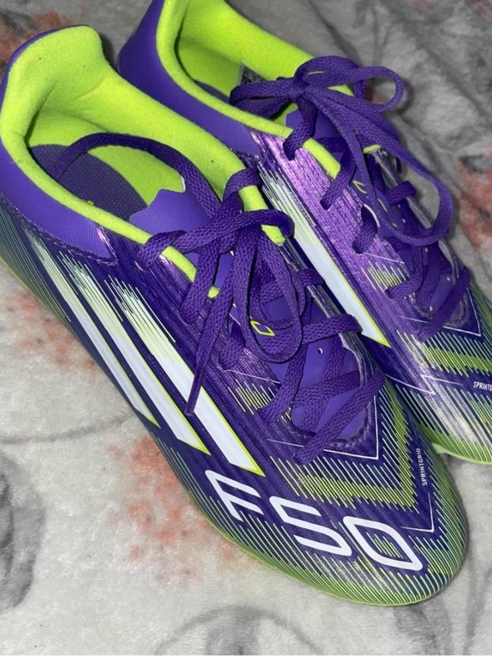 adidas Women’s Purple & Neon Green Athletic Cleats